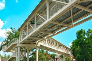 The only thing between your chic, comfortable hotel room and your November OCCC event is the Gary Sain Memorial Skybridge.